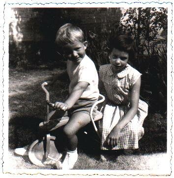 With sister on first trike (1960)